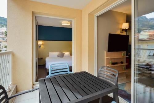 Imagen de la habitación del Aparthotel Adagio Monaco Monte Cristo. Foto 16