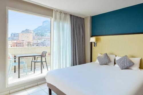 Imagen de la habitación del Aparthotel Adagio Monaco Monte Cristo. Foto 17