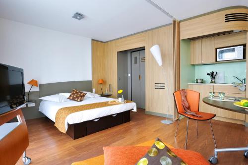 Imagen de la habitación del Aparthotel Adagio Nantes Centre. Foto 17