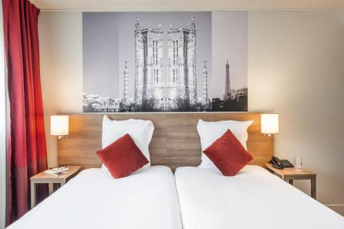 Imagen de la habitación del Aparthotel Adagio Original Thoiry Geneve. Foto 16