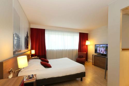 Imagen de la habitación del Aparthotel Adagio Original Thoiry Geneve. Foto 17