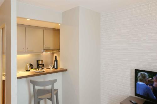 Imagen de la habitación del Aparthotel Adagio Original Thoiry Geneve. Foto 18