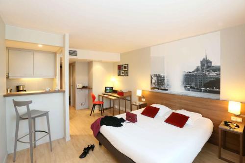 Imagen de la habitación del Aparthotel Adagio Original Thoiry Geneve. Foto 19