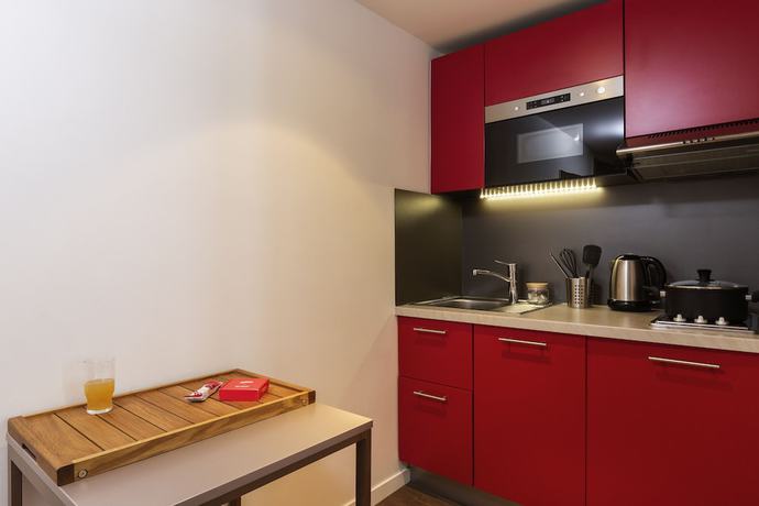 Imagen de la habitación del Aparthotel Adagio Paris Bercy Village. Foto 16