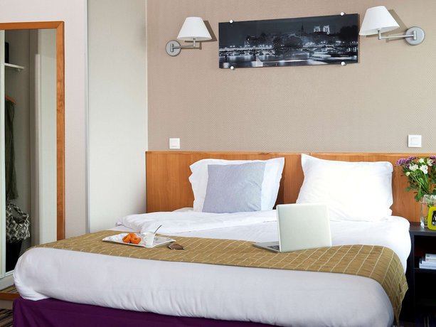 Imagen de la habitación del Aparthotel Adagio Paris Buttes Chaumont. Foto 10