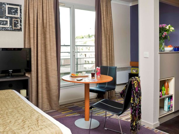 Imagen de la habitación del Aparthotel Adagio Paris Buttes Chaumont. Foto 12