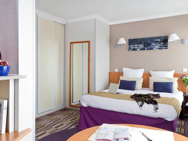 Imagen de la habitación del Aparthotel Adagio Paris Buttes Chaumont. Foto 18
