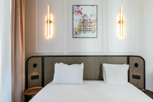 Imagen de la habitación del Aparthotel Adagio Paris Opera. Foto 11
