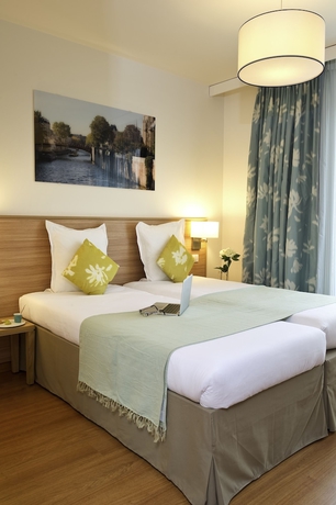 Imagen de la habitación del Aparthotel Adagio Paris Vincennes. Foto 7