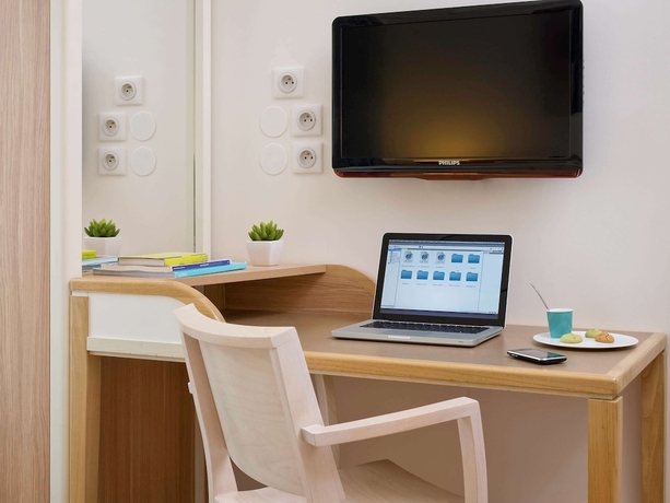 Imagen de la habitación del Aparthotel Adagio Paris Vincennes. Foto 10