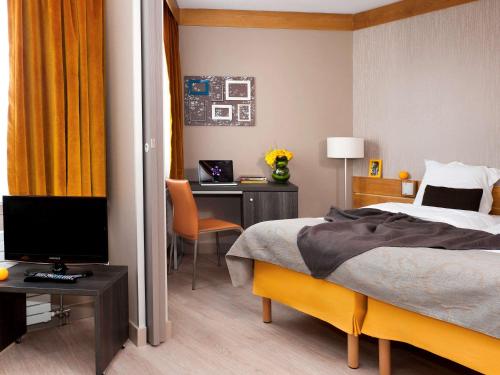 Imagen de la habitación del Aparthotel Adagio Paris XV. Foto 15