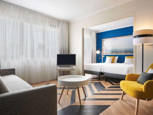 Imagen de la habitación del Aparthotel Adagio Porte De Versailles. Foto 11