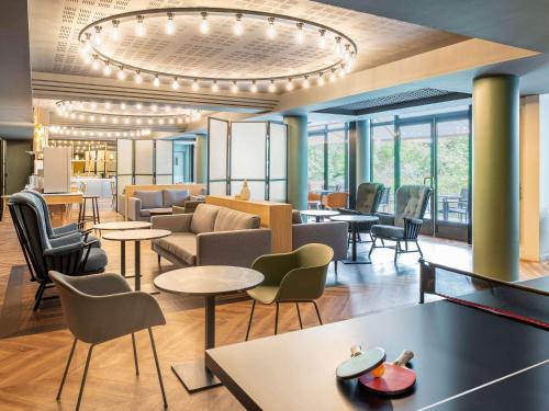 Imagen de la habitación del Aparthotel Adagio Porte De Versailles. Foto 12