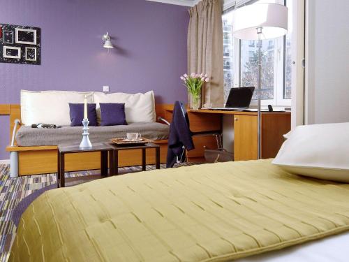 Imagen de la habitación del Aparthotel Adagio Porte De Versailles. Foto 16
