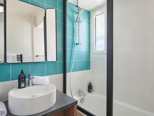 Imagen de la habitación del Aparthotel Adagio Porte De Versailles. Foto 17