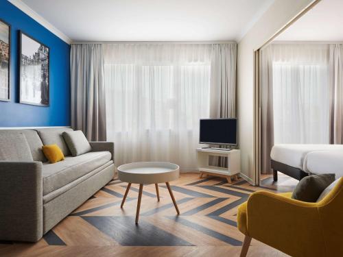 Imagen de la habitación del Aparthotel Adagio Porte De Versailles. Foto 18