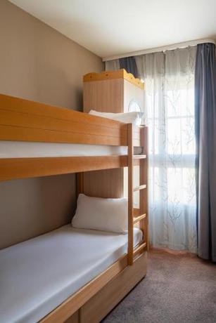Imagen de la habitación del Aparthotel Adagio Val d'Europe pr&egrave;s de Disneyland Paris. Foto 16
