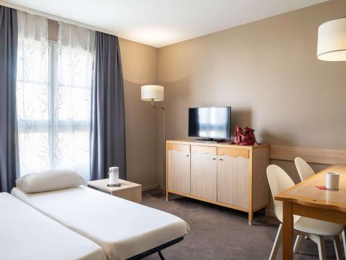 Imagen de la habitación del Aparthotel Adagio Val d'Europe pr&egrave;s de Disneyland Paris. Foto 20