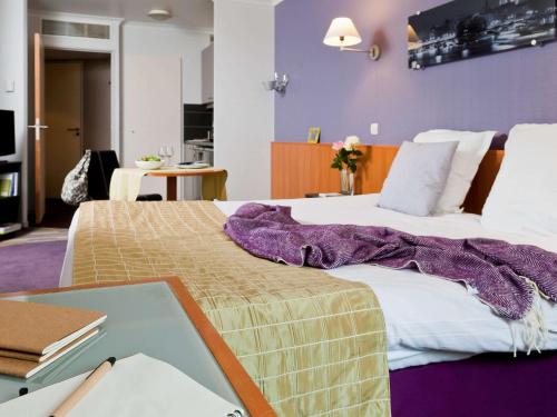 Imagen de la habitación del Aparthotel Adagio la Defense-Le Parc. Foto 18