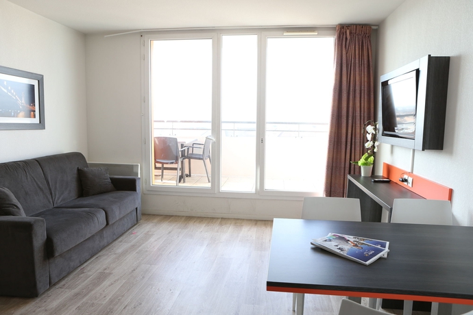 Imagen de los interiores del Aparthotel Adonis Paris Sud. Foto 16