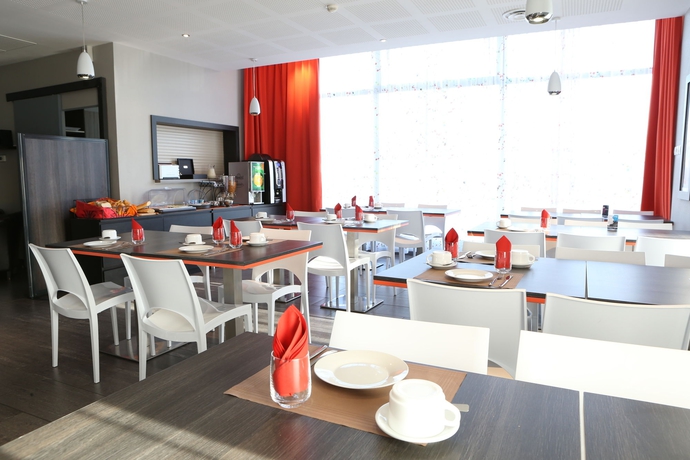 Imagen del bar/restaurante del Aparthotel Adonis Paris Sud. Foto 4
