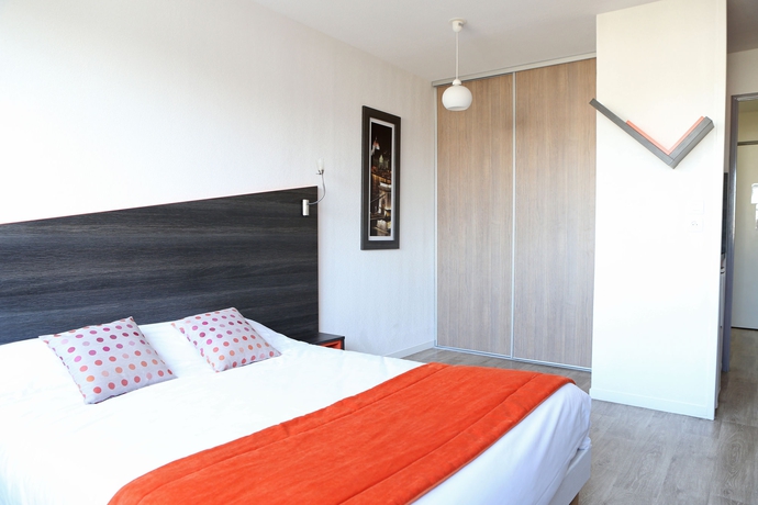 Imagen de la habitación del Aparthotel Adonis Paris Sud. Foto 9
