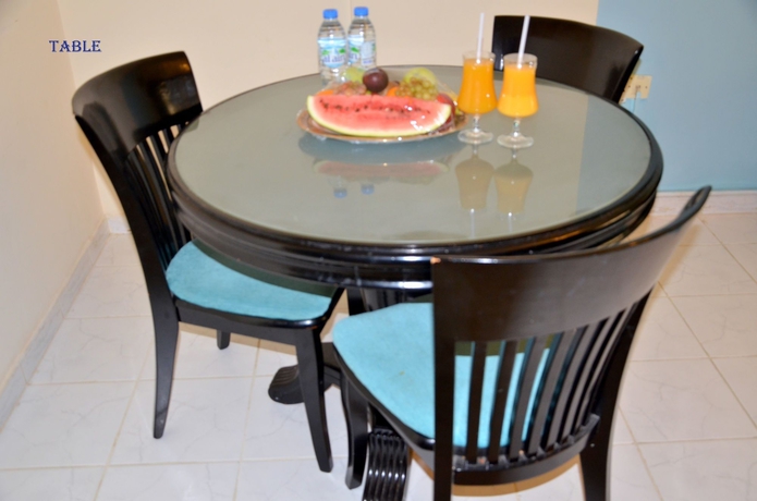 Imagen del bar/restaurante del Aparthotel Al Shams Plaza Hotel Apartments. Foto 4