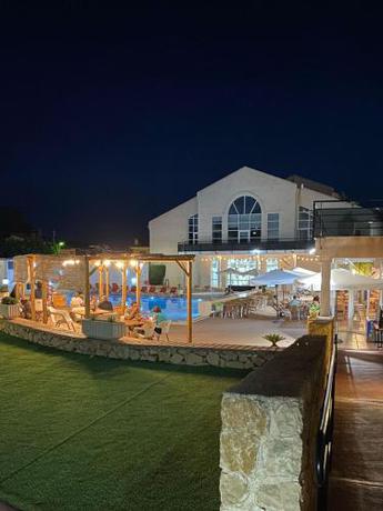 Imagen de los exteriores del Aparthotel Alfas Oasis. Foto 9