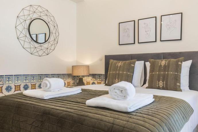 Imagen de la habitación del Aparthotel Ando Living Townhouse - Santa Justa 79. Foto 4