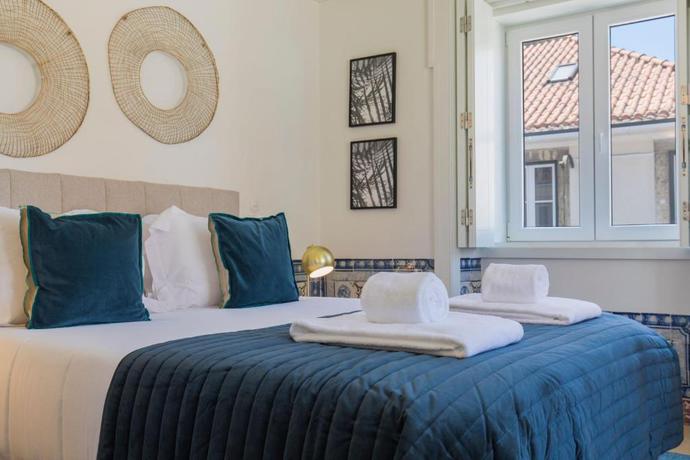 Imagen de la habitación del Aparthotel Ando Living Townhouse - Santa Justa 79. Foto 7