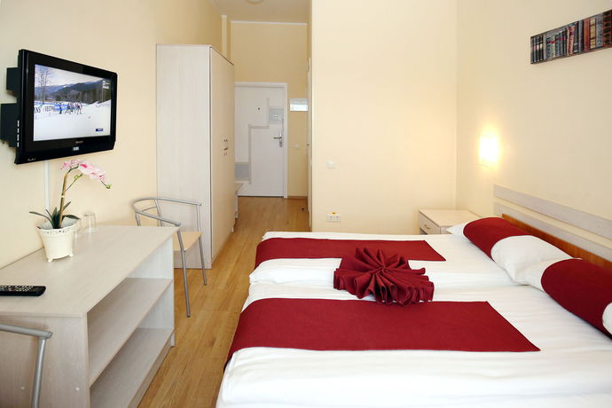 Imagen de la habitación del Aparthotel Apart Hotel Tomo. Foto 9