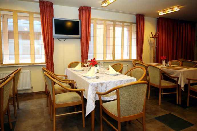 Imagen del bar/restaurante del Aparthotel Apart Hotel Tomo. Foto 5