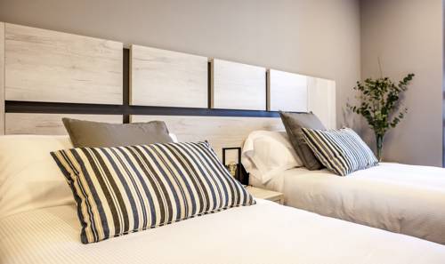Imagen de la habitación del Aparthotel Apartahotel 5dos5. Foto 4