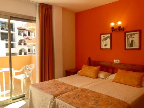 Imagen de la habitación del Aparthotel Apartamentos Jovial. Foto 2