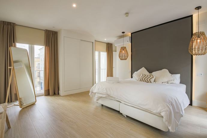Imagen de la habitación del Aparthotel Apartamentos Magna Sevilla. Foto 8