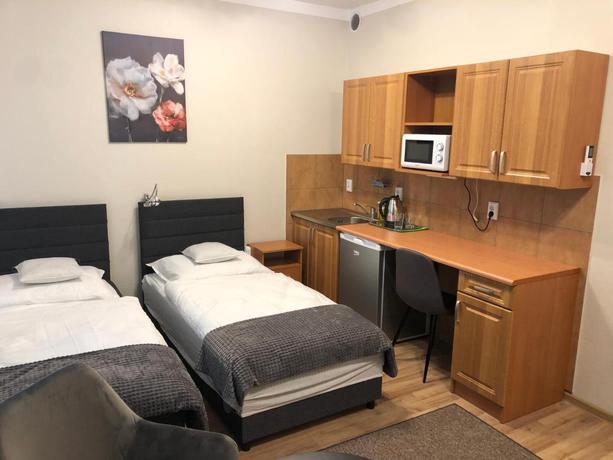 Imagen de la habitación del Aparthotel Apartamenty JN Poznań Rzeczna 4. Foto 8