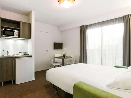 Imagen de la habitación del Aparthotel Aparthotel Adagio Access Nantes Viarme. Foto 18