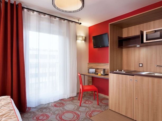 Imagen de la habitación del Aparthotel Aparthotel Adagio Lyon Patio Confluence. Foto 11