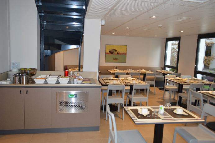 Imagen del bar/restaurante del Aparthotel Aparthotel Adagio Lyon Patio Confluence. Foto 2