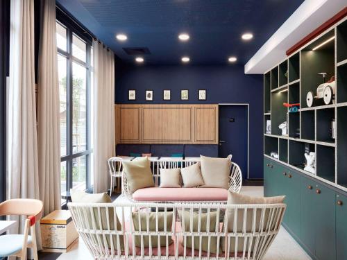 Imagen de los interiores del Aparthotel Aparthotel Adagio Paris Suresnes Longchamp. Foto 12