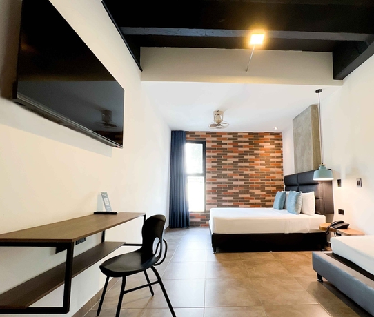 Imagen de la habitación del Aparthotel Apartments Pool and Rooftop Downtown. Foto 13