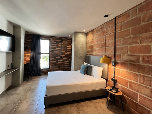 Imagen de la habitación del Aparthotel Apartments Pool and Rooftop Downtown. Foto 14