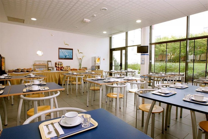 Imagen del bar/restaurante del Aparthotel Appart'city Confort Toulouse Diagora Lab&egrave;ge. Foto 2