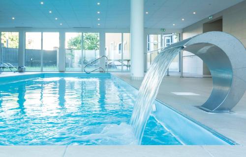 Imagen de la piscina del Aparthotel Appart'h&ocirc;tel Odalys City - Colmar Centre. Foto 8