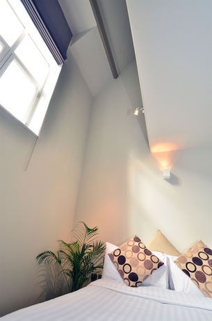Imagen de la habitación del Aparthotel Arch. Foto 11
