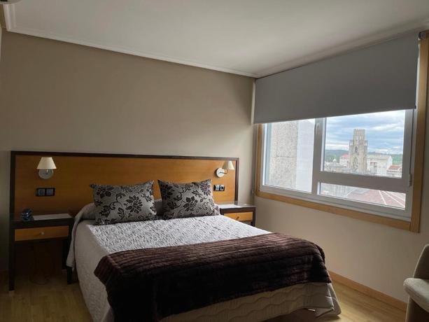 Imagen de la habitación del Aparthotel Arenteiro. Foto 3