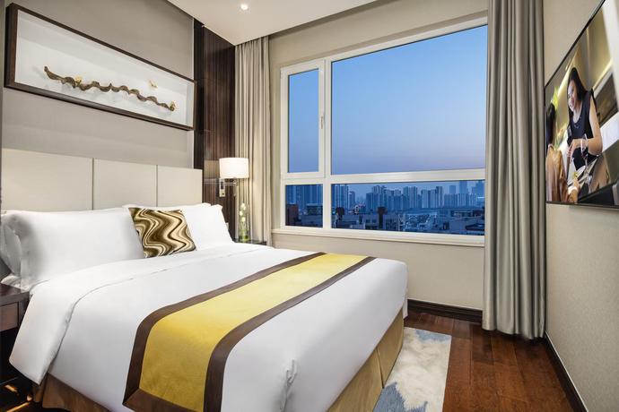 Imagen de la habitación del Aparthotel Ascott Teda Msd Tianjin. Foto 8
