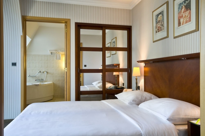 Imagen de la habitación del Aparthotel B- Ambiorix. Foto 14