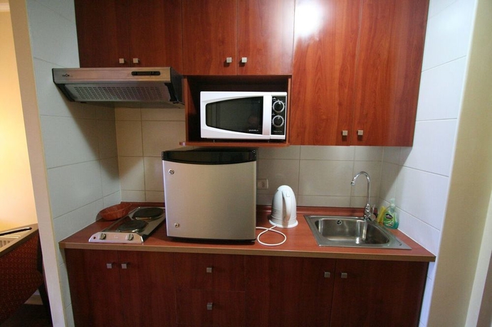 Imagen de la habitación del Aparthotel BMB Suites Apart Hotel. Foto 5