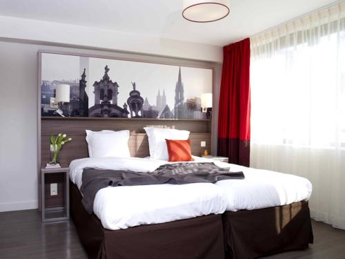 Imagen de la habitación del Aparthotel B&B HOME Caen Centre Gare. Foto 19